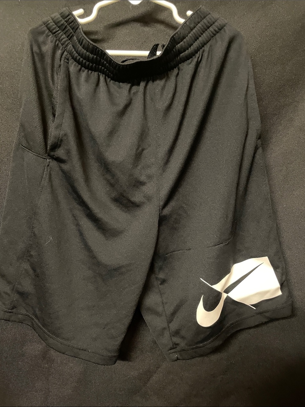 Nike Black Athletic Shorts with White Swoosh Accent